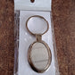 Elegant Oval Shape Metal Keychain for Personal Use